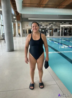 Workout photo from a lap swimming session, restyled by ActivArt in the Cinematic style with the athlete's face and pose preserved